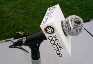 car doctor show microphone during broadcast